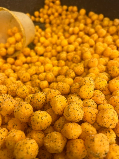 Close-up of seasoned orange cheese balls