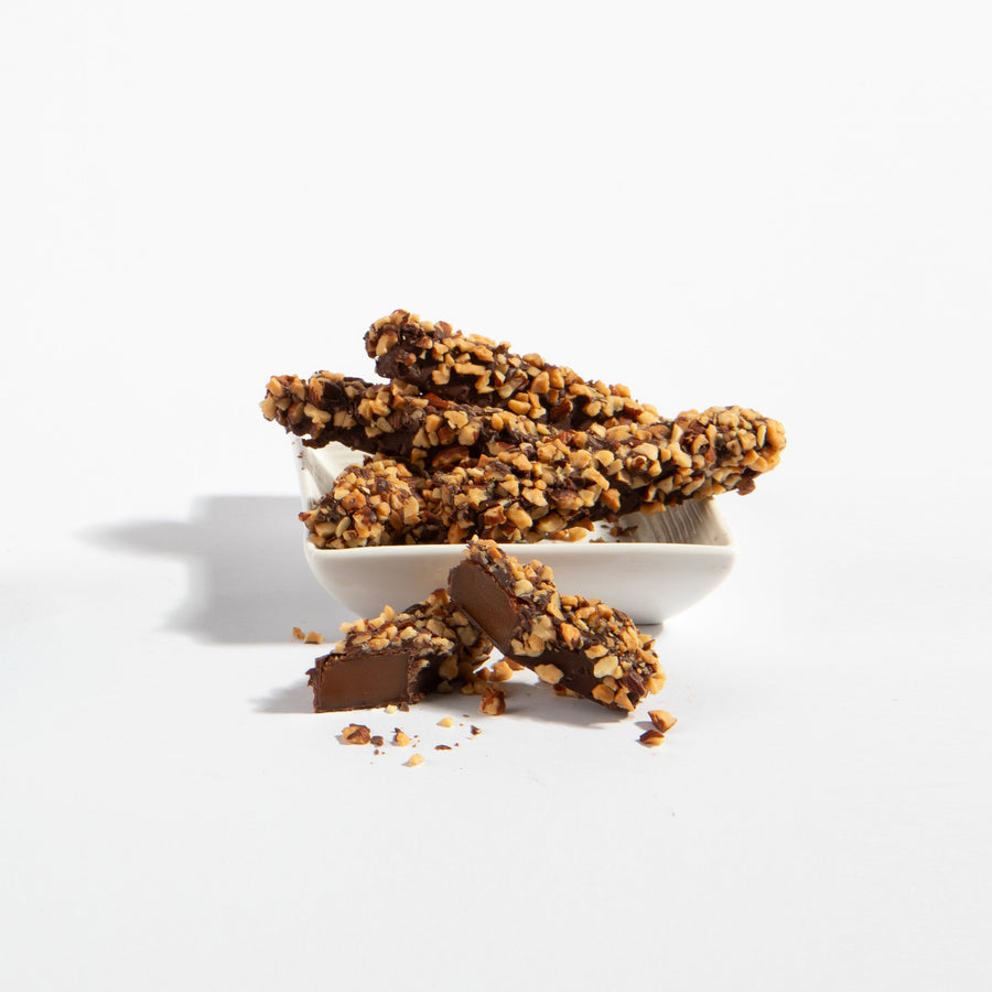 Caramel almond sticks showing the caramel center and almond coating