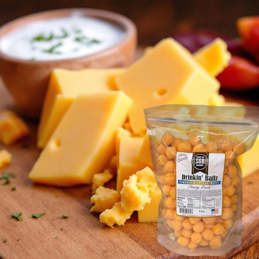Cheezy Ranch Cheese Balls - clear bag styled with cheese and ranch dip