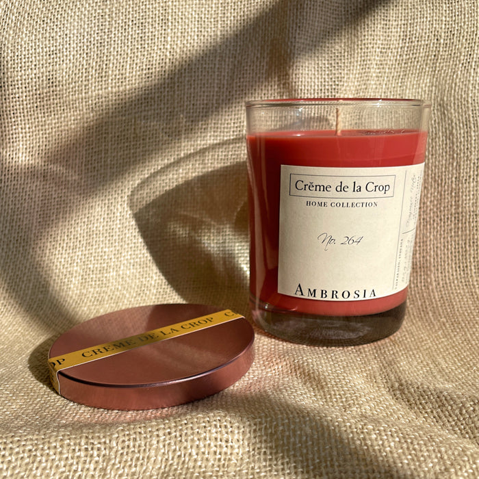 Ambrosia Soy Candle in a labeled glass container