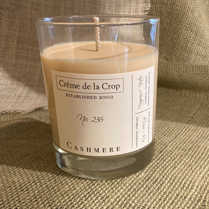Cashmere Soy Candle in a labeled glass container