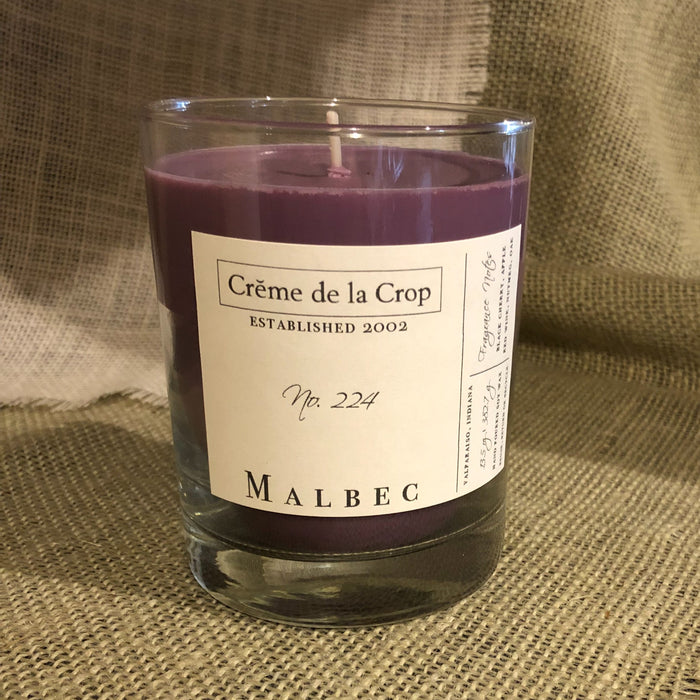 Malbec Soy Candle in a labeled glass container