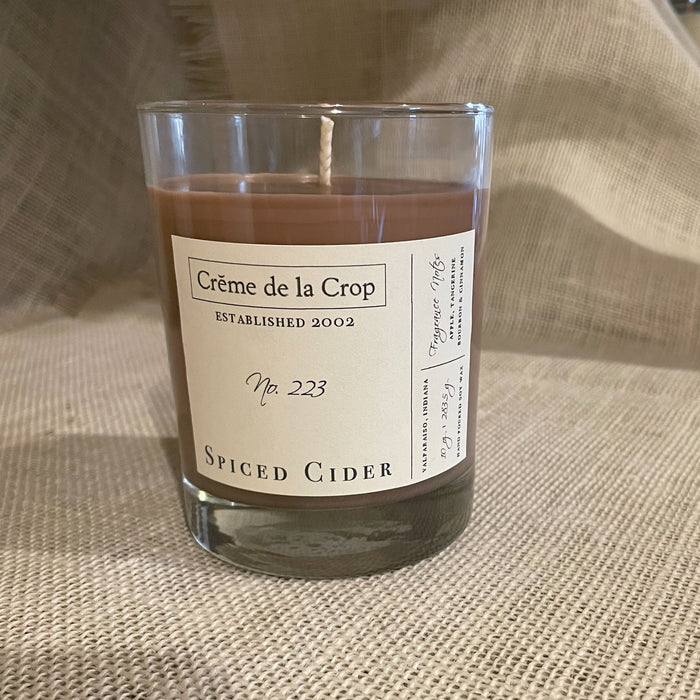Spiced Cider Soy Candle in a labeled glass container