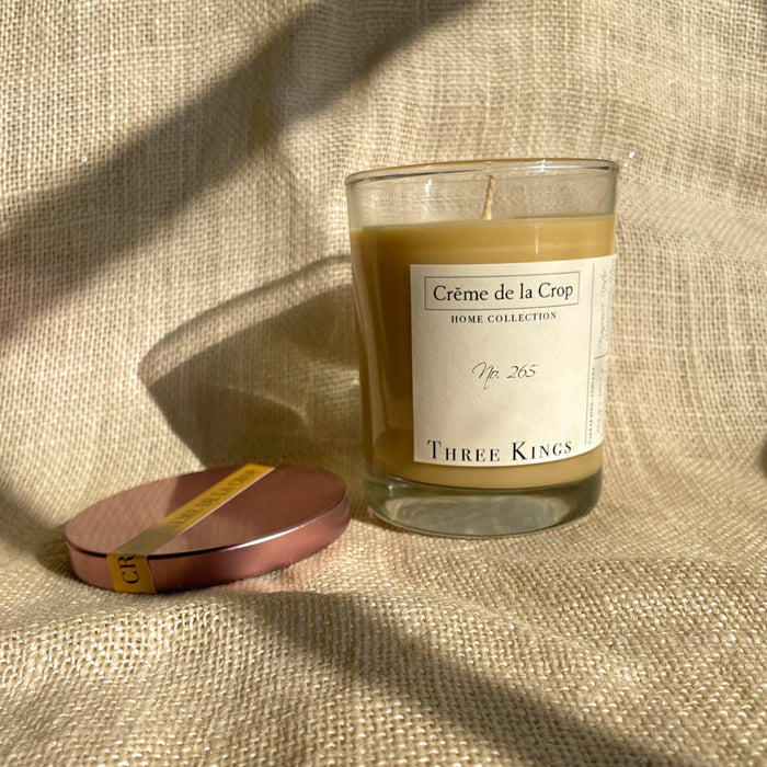Three Kings Soy Candle in a labeled glass container