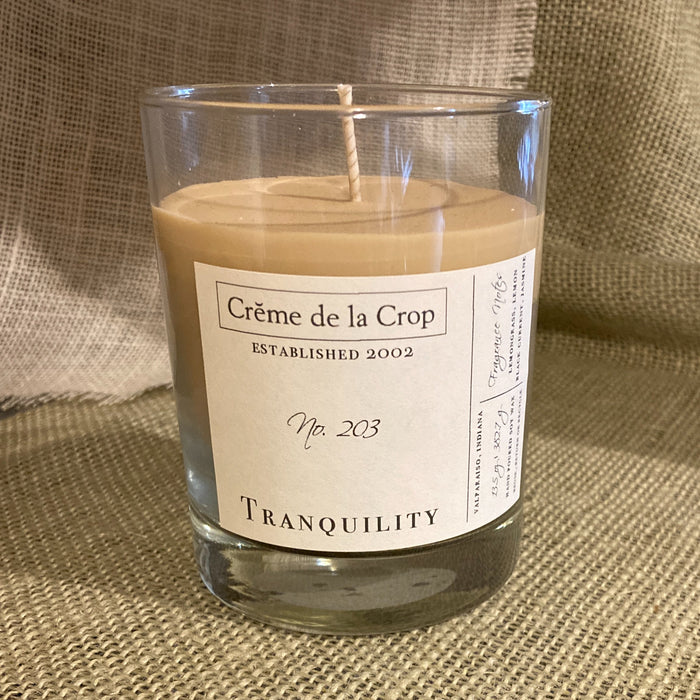 Tranquility Soy Candle in a labeled glass container