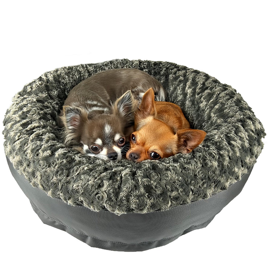 Two small dogs resting in a charcoal Furvana round bolster dog bed