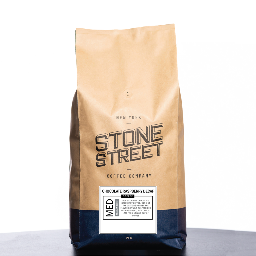 Front of the Stone Street Chocolate Raspberry Decaf coffee bag with its product label visible