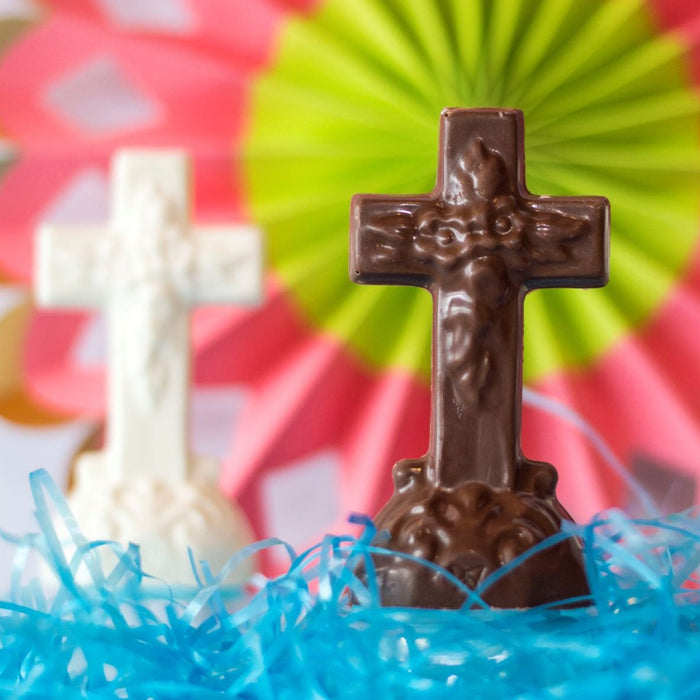 Solid chocolate cross in a colorful Easter display