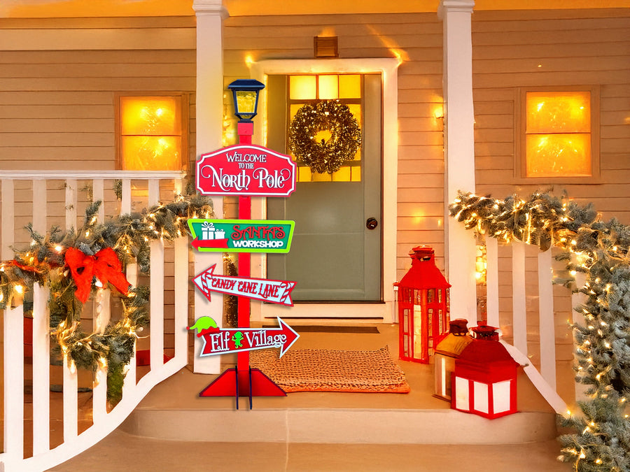 Completed Christmas signpost display with post and lantern shown as styling examples