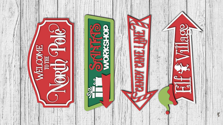 Painted examples of the Christmas directional arrows