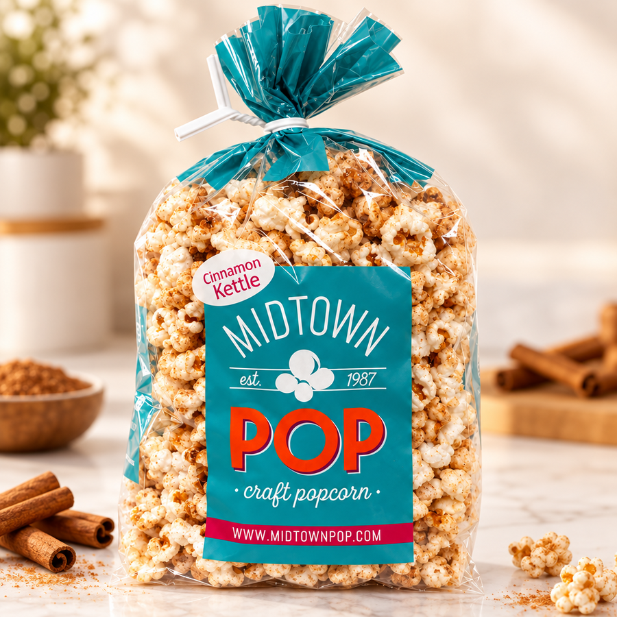 Cinnamon kettle corn bag displayed beside cinnamon sticks