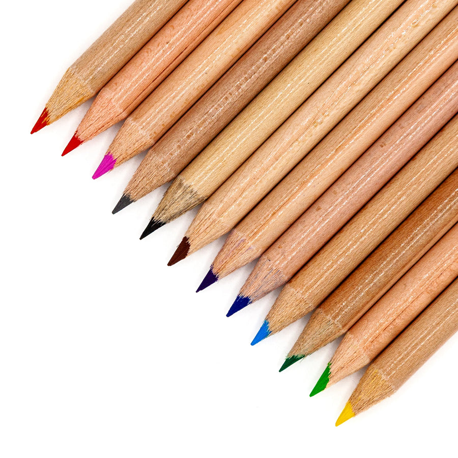 Angled close-up of sharpened colored pencil tips and wood casings