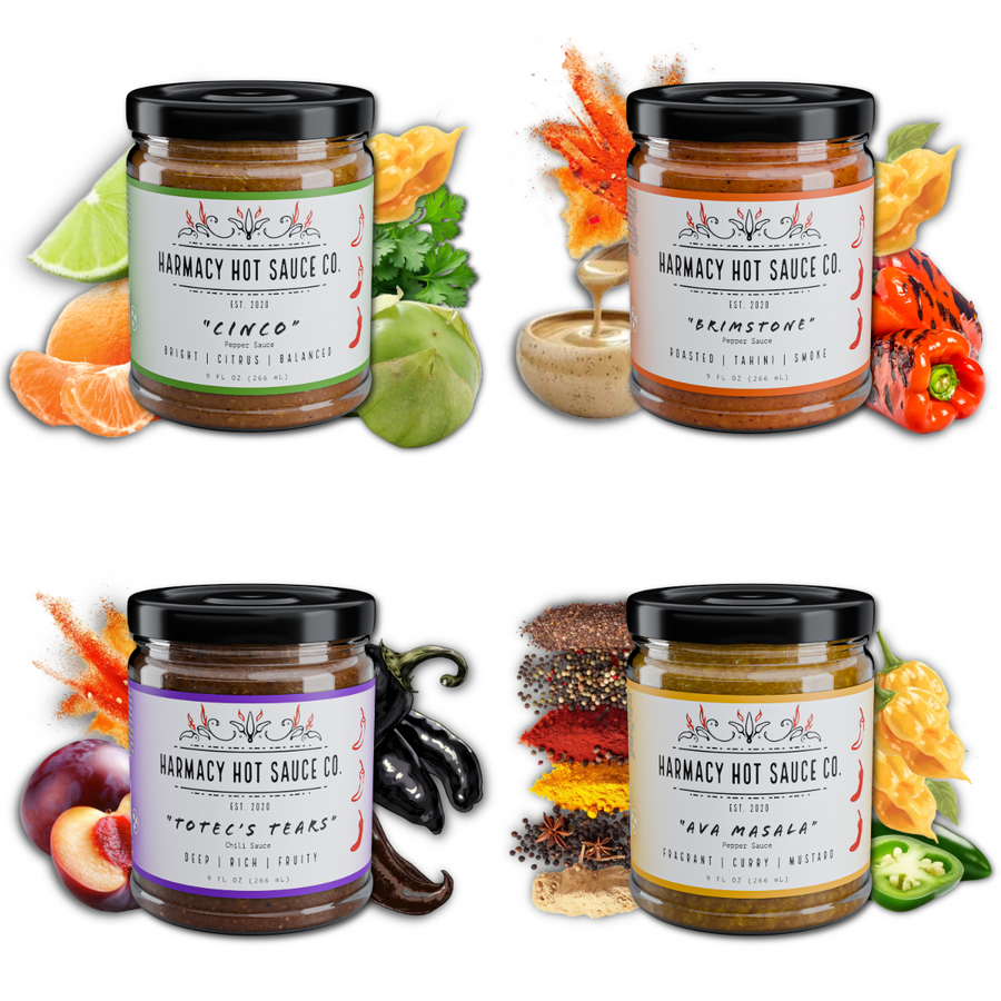 Essential Four sauces shown with fruit, peppers and spices