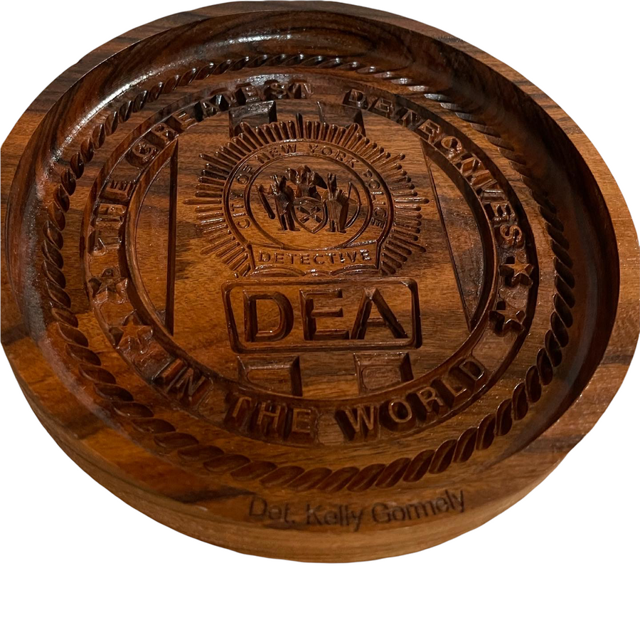 Engraved agency-emblem tray with a recessed center