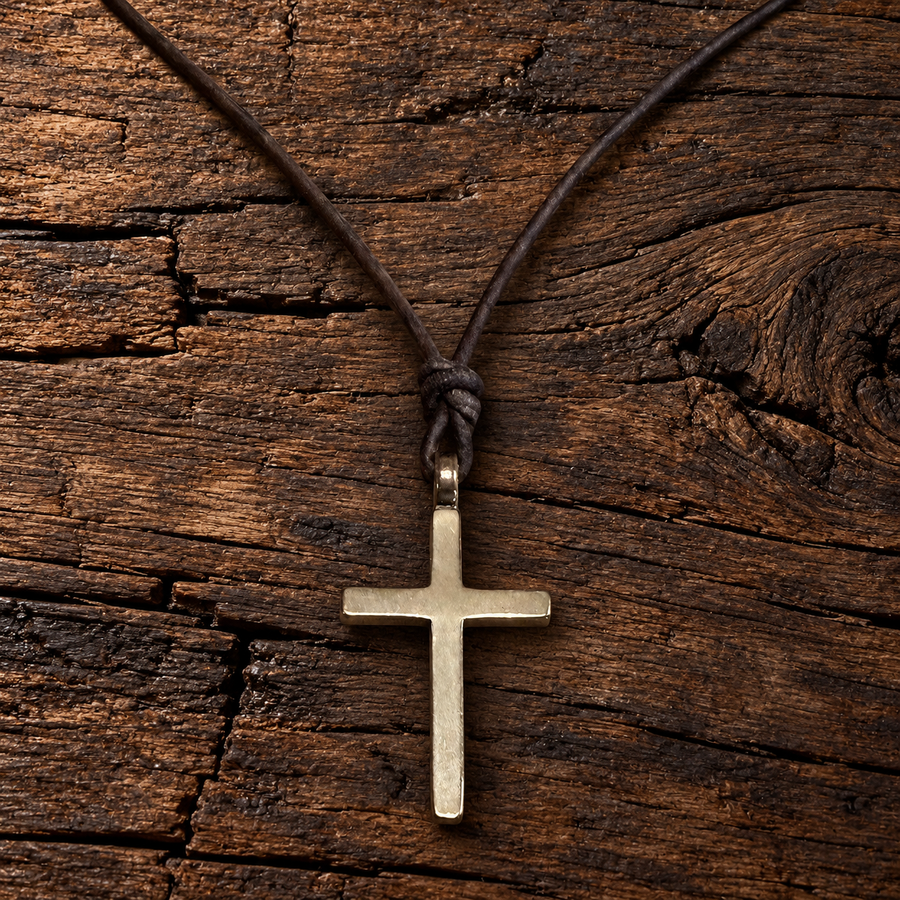 Classic Cross necklace against wood