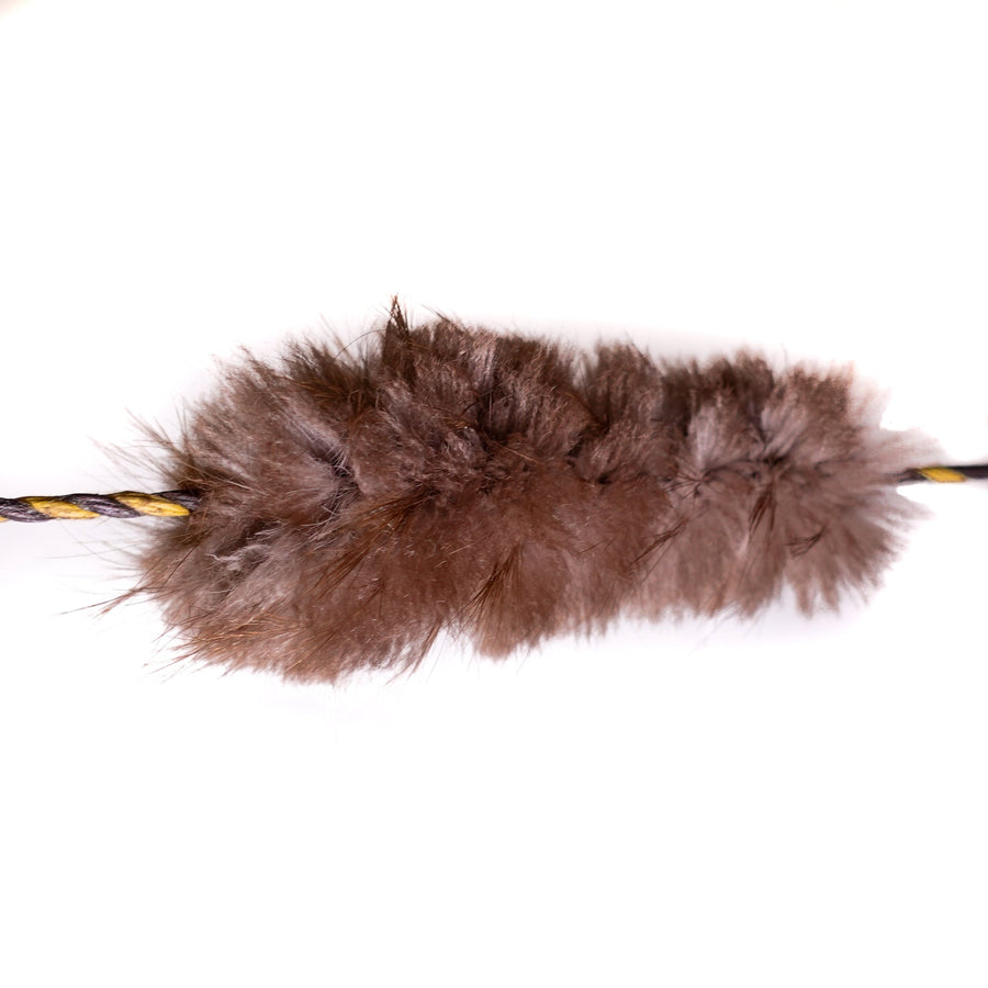 Beaver Fur Bowstring Silencers — installed beaver-fur silencer close-up