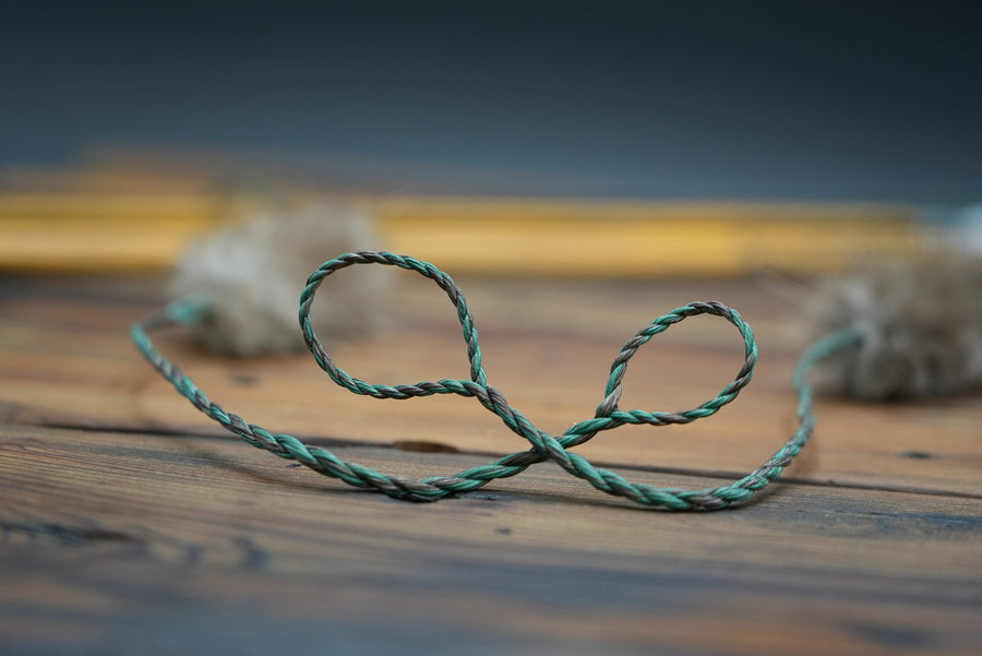 D97 Hunting Bowstring — two camo loops laid out