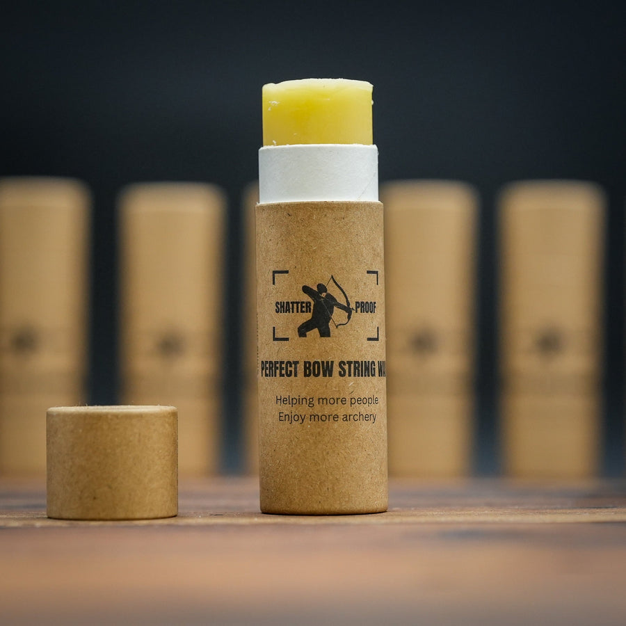 Sticky Perfect Bowstring Wax — wax tube beside additional tubes