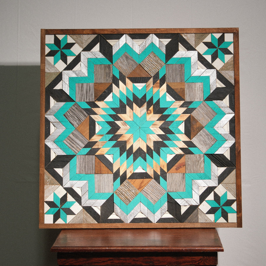 Individual reclaimed-wood barn quilt with a hand-painted geometric star design