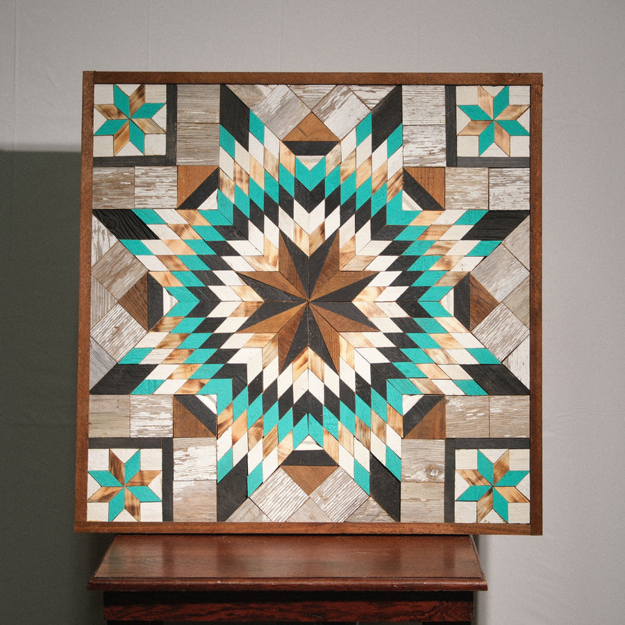 Individual reclaimed-wood barn quilt with a hand-painted geometric star design
