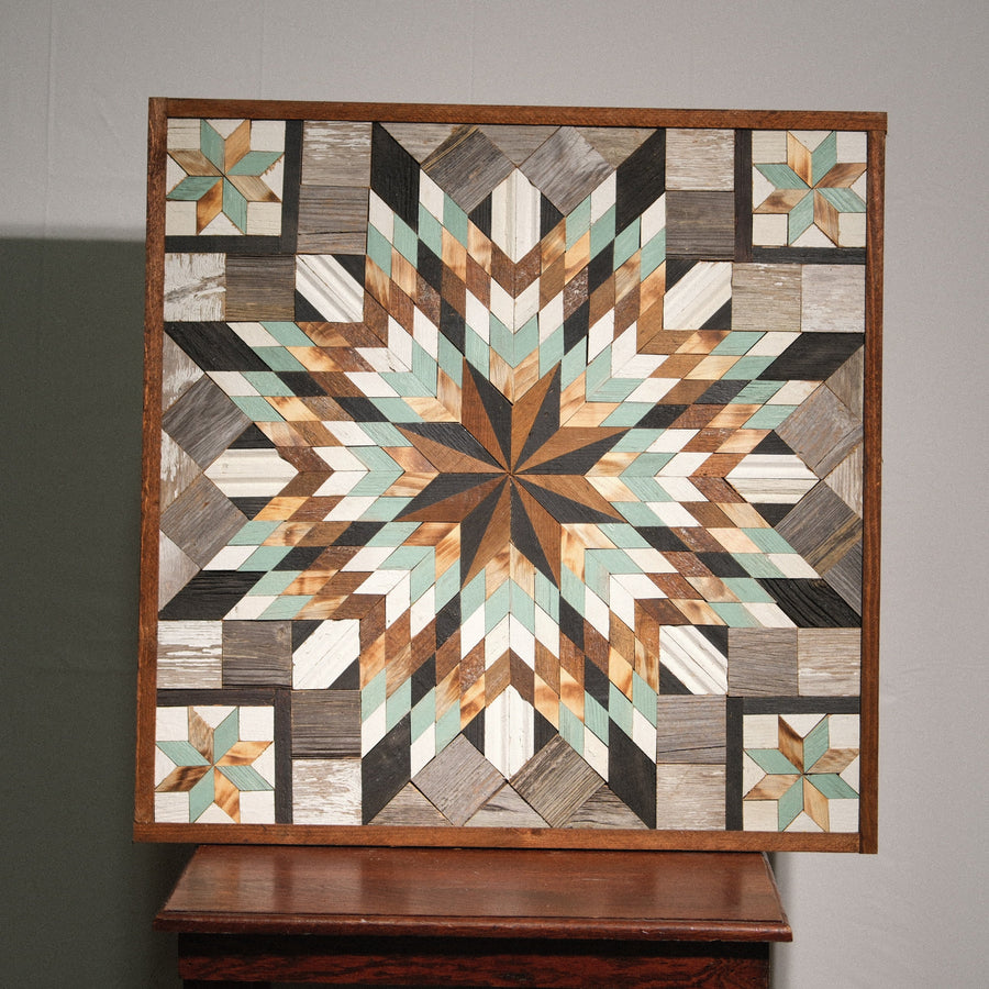 Individual reclaimed-wood barn quilt with a hand-painted geometric star design