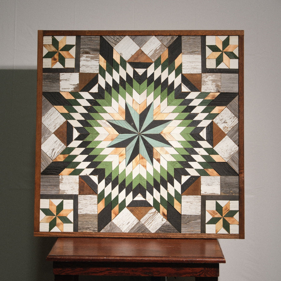 Individual reclaimed-wood barn quilt with a hand-painted geometric star design