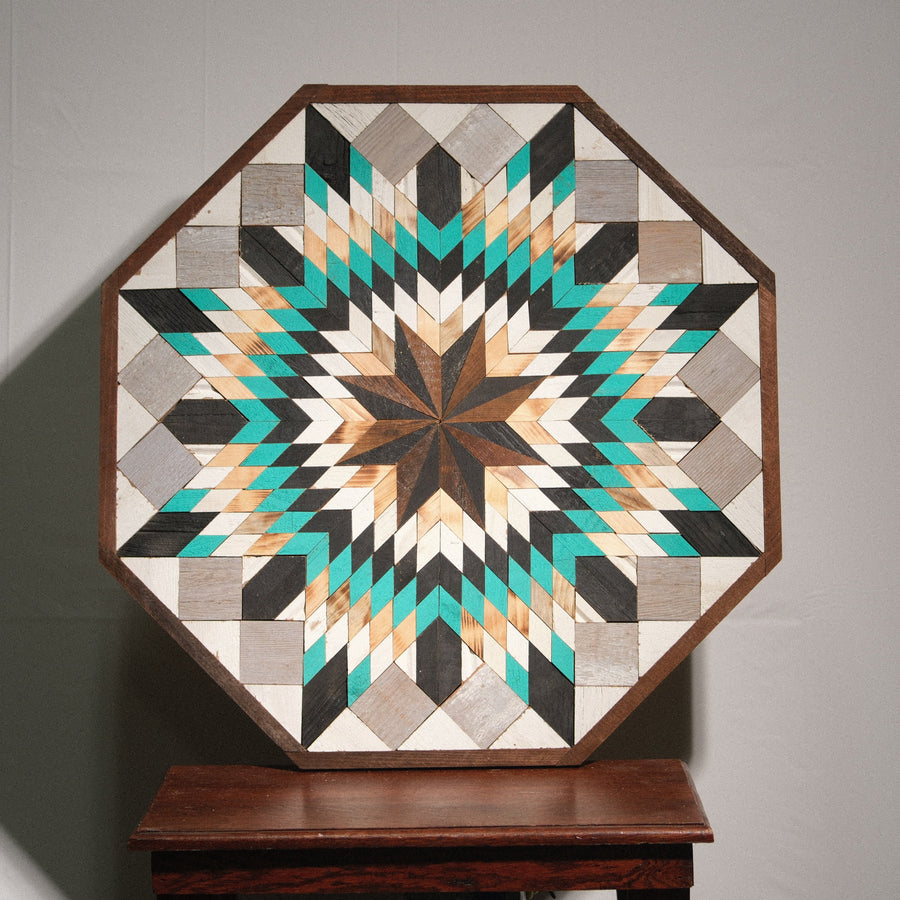 Individual reclaimed-wood barn quilt with a hand-painted geometric star design