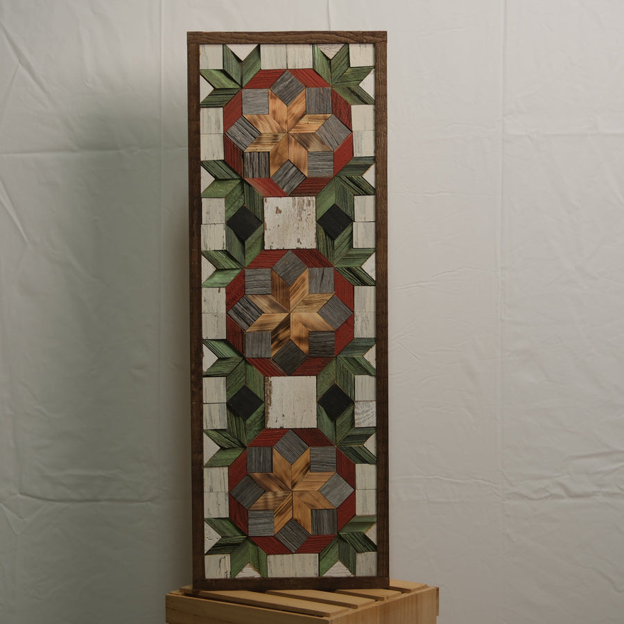 Tall reclaimed-wood barn quilt banner with a hand-painted geometric star design