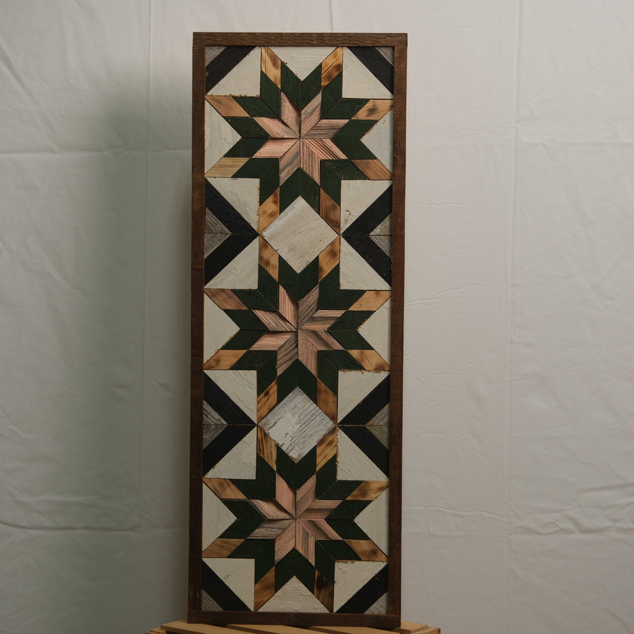 Tall reclaimed-wood barn quilt banner with a hand-painted geometric star design
