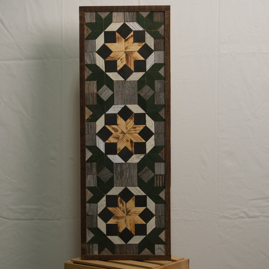 Tall reclaimed-wood barn quilt banner with a hand-painted geometric star design