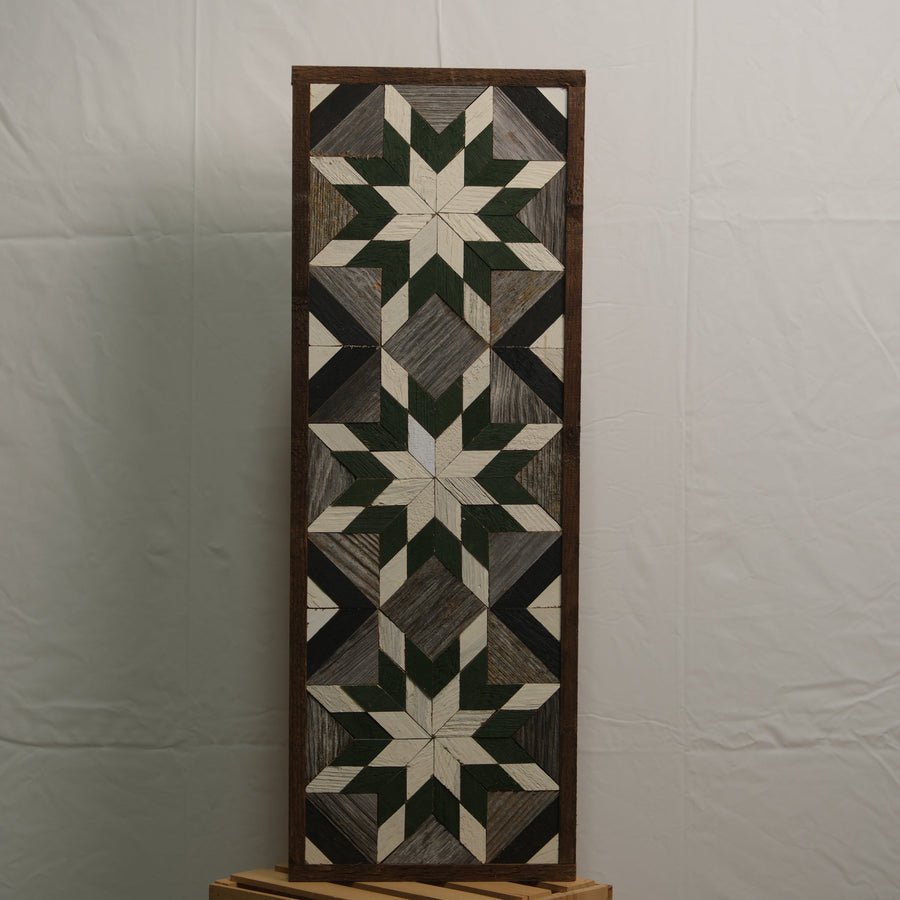 Tall reclaimed-wood barn quilt banner with a hand-painted geometric star design