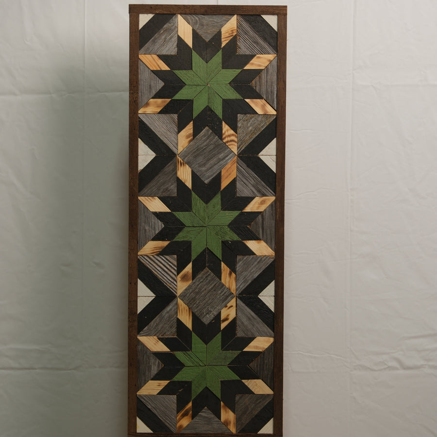 Tall reclaimed-wood barn quilt banner with a hand-painted geometric star design