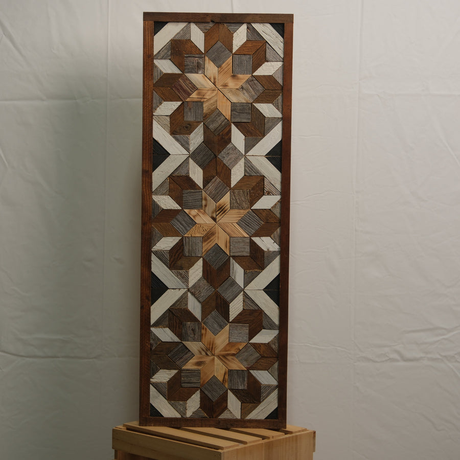 Tall reclaimed-wood barn quilt banner with a hand-painted geometric star design