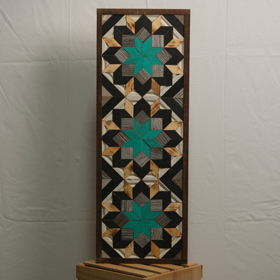 Tall reclaimed-wood barn quilt banner with a hand-painted geometric star design