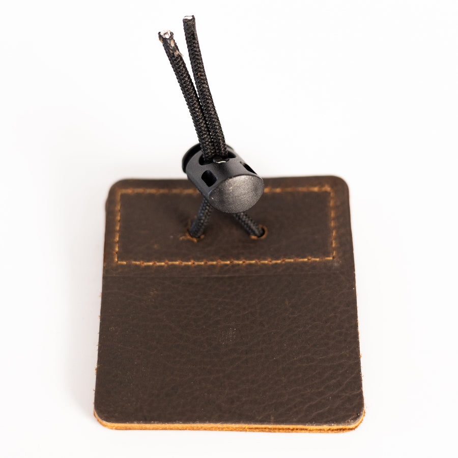 3-Under Leather Archery Tab — reverse view of tab and cord