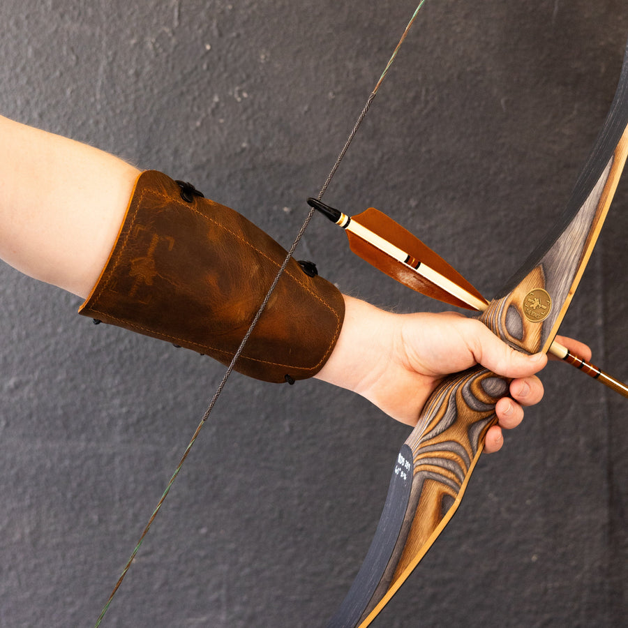 Ultimate Leather Archery Armguard — leather guard at full draw