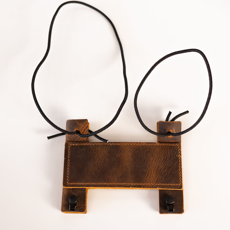 Compact Leather Archery Arm Guard — arm guard and adjustable cords