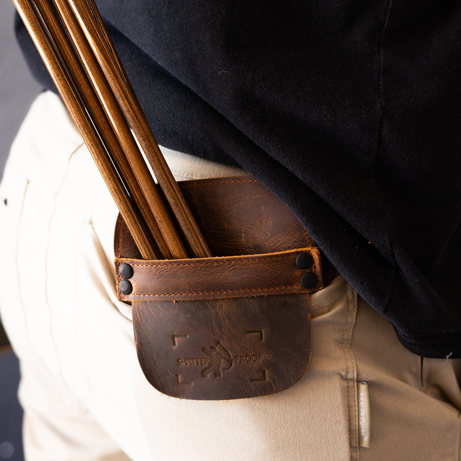 Leather Pocket Arrow Quiver — arrows carried in a hip-pocket quiver