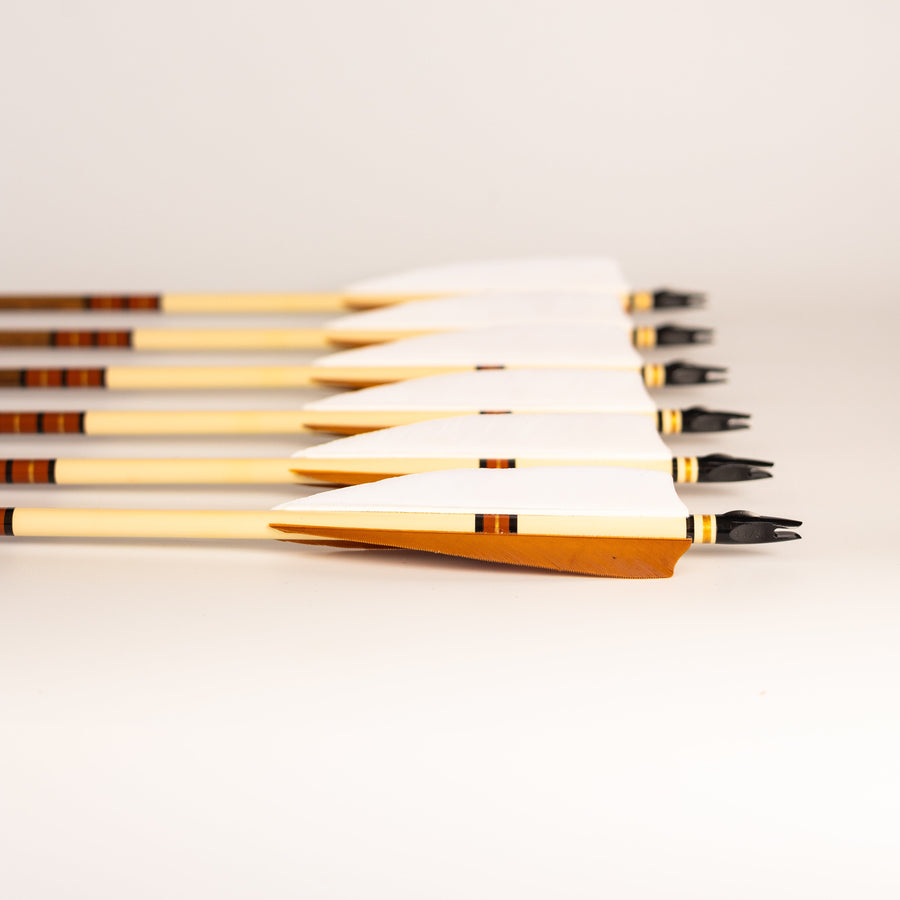 USA-Made Western Larch Wood Arrows — six wood arrows arranged together