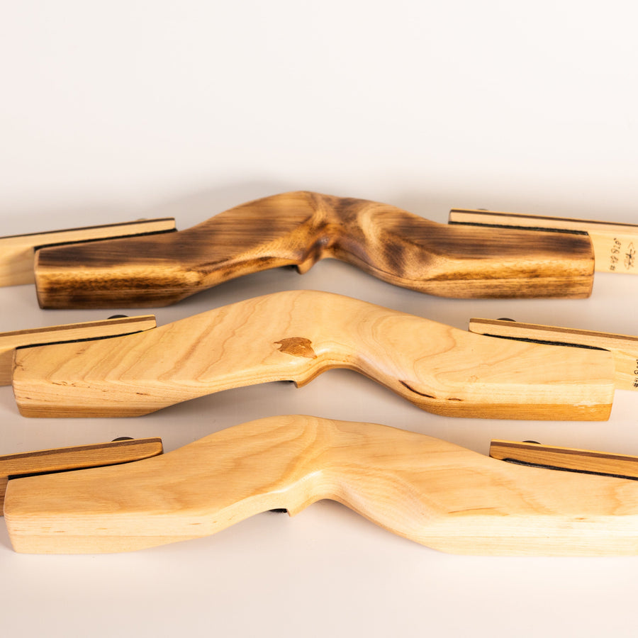 DIY Wood Takedown Bow Kit — two completed wood bows as build examples
