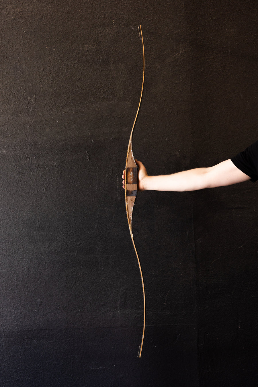 Bare BONES Fiberglass Bow-Building Kit — bow blank held vertically