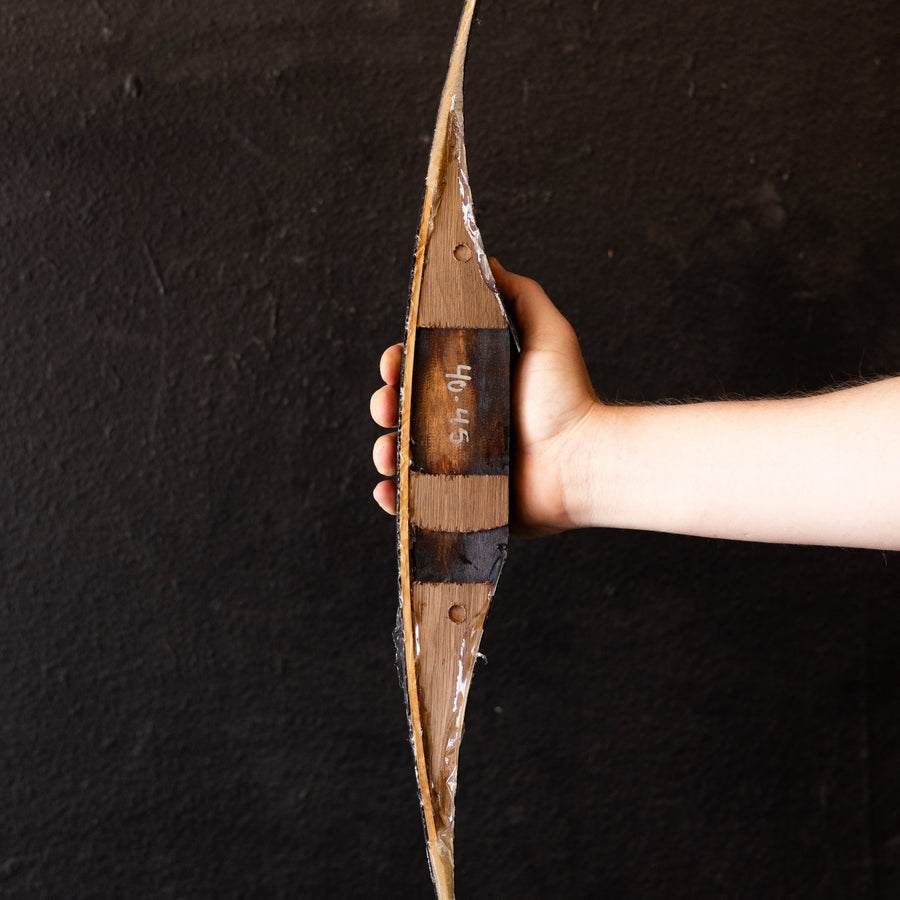 Bare BONES Fiberglass Bow-Building Kit — archer holding completed bow example