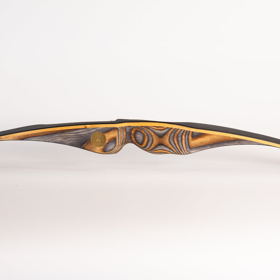 BONES Reflex-Deflex Longbow — bow riser laid horizontally