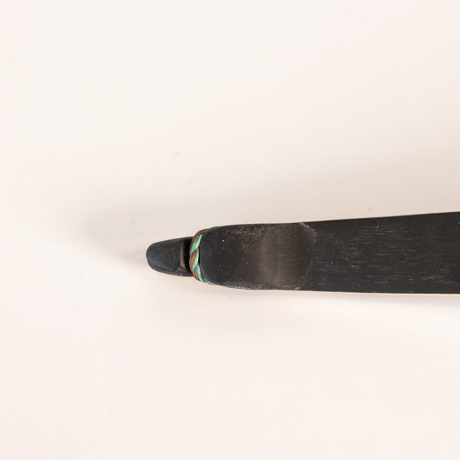 BONES Reflex-Deflex Longbow — limb-tip surface detail