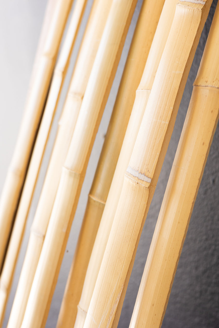 Bamboo Bow-Backing Slats — bamboo strips against wall