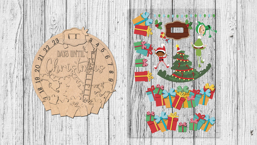 Unfinished Elves Workshop countdown backer beside a colorful transfer example