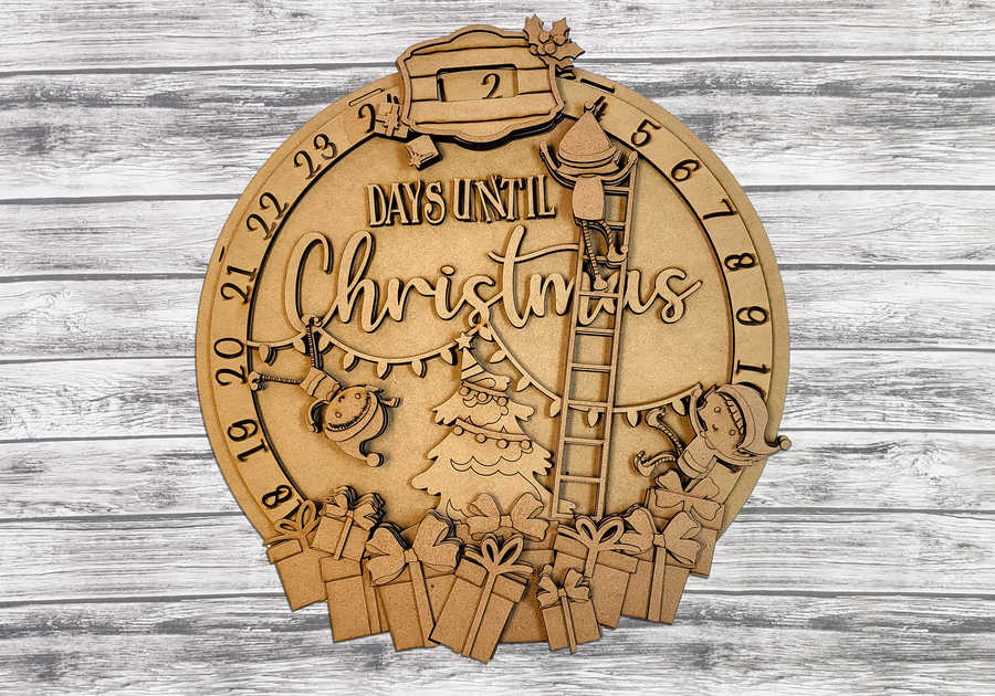 Unfinished layered Elves Workshop rotating Christmas countdown calendar