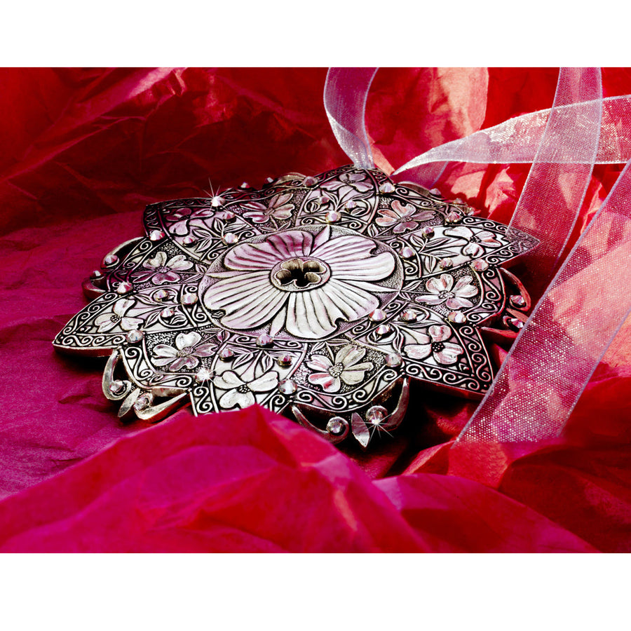 Styled display featuring Snow Crystal Dogwood Ornament
