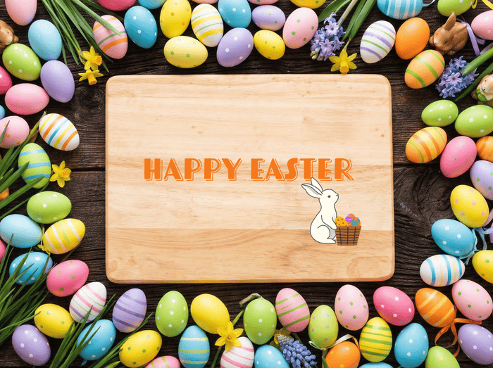 Happy Easter wooden serving board surrounded by decorated eggs