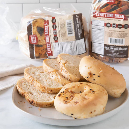 Everything Low Carb Sliced Bread: packaged bread and bagel serving arrangement.